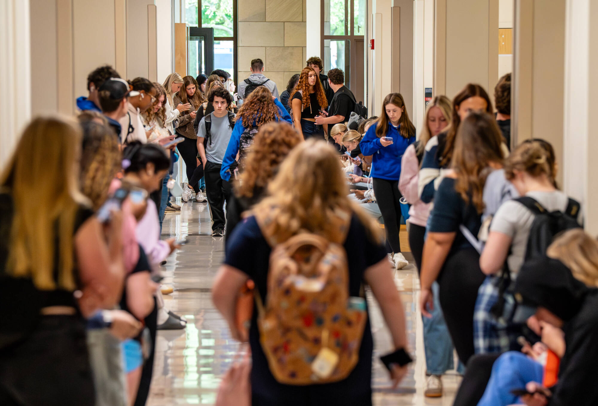Students walk inside the Kindschi Hall of Science on the first day of classes on August 22.